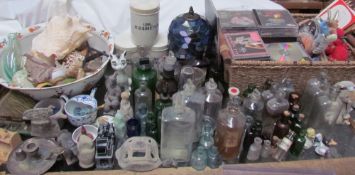 A collection of CD's and DVD's together with pharmacy bottles and jars, Tiffany style table lamp,