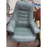 A green leather swivel chair