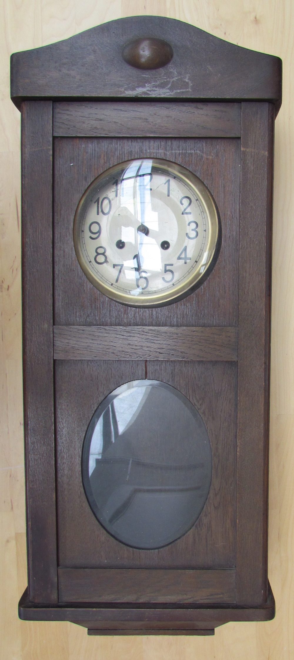 A 20th century oak wall clock