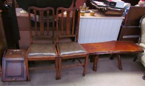 An Edwardian oak coal purdonium together with a pair of oak dining chairs and a low pine coffee