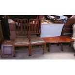An Edwardian oak coal purdonium together with a pair of oak dining chairs and a low pine coffee