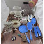 Silver and enamel part dressing table sets together with a Poole pottery preserve pot and cover,
