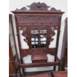 A 19th century oak hall stand,