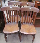 A set of four Victorian slat back chairs together with a stool