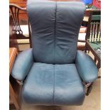 A green leather swivel chair together with a reproduction mahogany Hifi cabinet