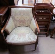 A reproduction mahogany elbow chair together with a set of four folding garden chairs