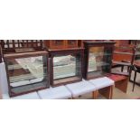 Three glazed hanging display cabinets together with oak hanging shelves