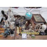 A Nao figure of a doctor together with other figures, glass medicine measure, stone figures,