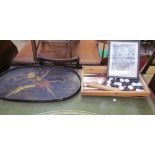 A lacquer tray decorated with a phoenix on a branch together with a backgammon board,