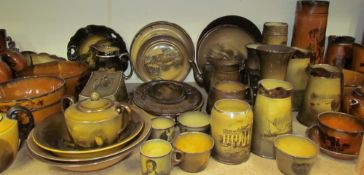 An extensive collection of Ridgways pottery jugs, part tea sets, moustache cups, plaques, bowls,