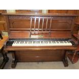 An Amyl mahogany upright piano, metal framed, overstrung, No.