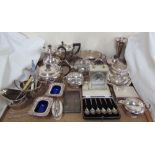 An electroplated three piece part tea set, together with other electroplated wares including salts,