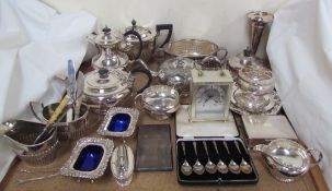 An electroplated three piece part tea set, together with other electroplated wares including salts,