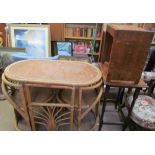 A Wicker conservatory table and two chairs together with an oak occasional table and a bergère