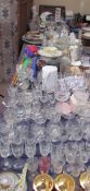 An extensive lot including drinking glasses, umbrellas, walking sticks, flatwares, trays,