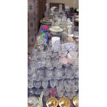 An extensive lot including drinking glasses, umbrellas, walking sticks, flatwares, trays,