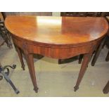 A mahogany card table,