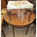 A dressing table stool with leaf carved cabriole legs and ball and claw feet together with a D