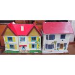 A doll's house with a red painted roof and yellow shutters together with another doll's house