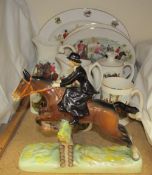 A Beswick Ware huntswoman jumping a fence riding side saddle together with a collection of hunting