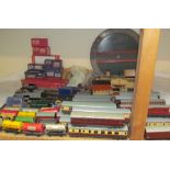 A Hornby Dublo - a quantity of corridor coaches, rolling stock, buildings and a track,