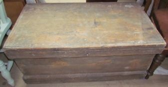 A 19th century pine coffer with a plinth base