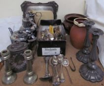 A pair of electroplated candlesticks together with electroplated flatwares, teapots,