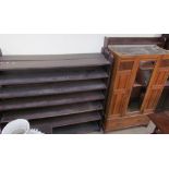 A large pair of oak bookcases together with another bookcase and an Edwardian wardrobe