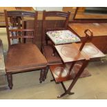 A pair of Edwardian walnut salon chairs together with a foot stool and a folding mahogany cake