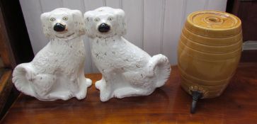 A pair of Staffordshire spaniels with gilt highlights together with a price stoneware flagon