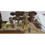 A brass miners lamp together with a brass miner, brass bells, loom shuttle, postcards,