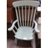 A 19th century green painted slat back kitchen chair