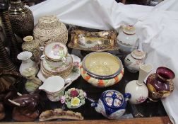 A Japanese porcelain teapot and cream jug together with a Japanese twin handled pedestal dish,