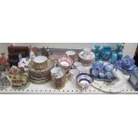 Assorted model cottages together with a continental part coffee set, enamel vases, glass vases,