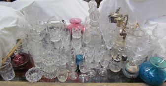 Glass decanters together with electroplated topped claret jugs, a Mdina glass vase,