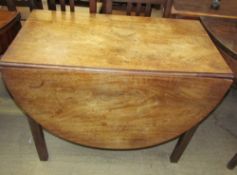 A 19th century mahogany gateleg dining table