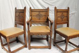 A set of six 17th century style oak dining chairs,