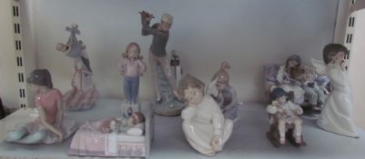 Assorted Lladro figures including a Stork carrying a baby, ballerina, children,