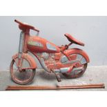 An Mobo tin plate pedal motorbike and a pair of measure sticks
