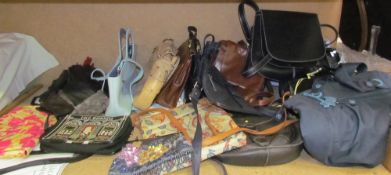 A Lulu Guinness handbag together with a collection of handbags and purses etc