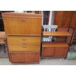 A teak Ladderax wall unit with a drop front,