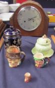 A Mantle clock, together with assorted Royal Doulton character jugs,