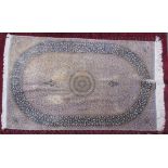 A silk mix rug with a purple ground with multiple flower heads,