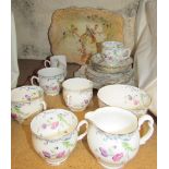 A Royal Albert floral decorated part tea service together with a pottery dish