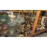 A large lot including assorted glass vases, table lamp, brass oil lamps, horse brasses, binoculars,