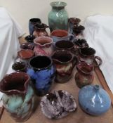 A collection of Ewenny pottery jugs,