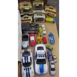 A collection of toy cars including Maisto, Matchbox,