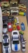 A collection of toy cars including Maisto, Matchbox,