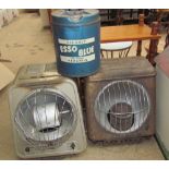 Two radiant oil heaters together with an Esso Blue paraffin tin