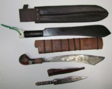 Two machetes together with fishing priests, a dagger,